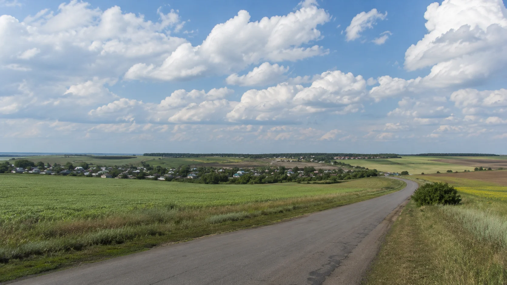 Panorama of the Nekhaevsky District with fields and open sky